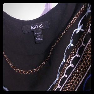 Sleeveless dress shirt.